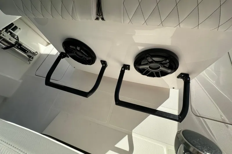  Yacht Photos Pics Interior of 2022 Fountain 38 CC LS boat with speakers and footrests.