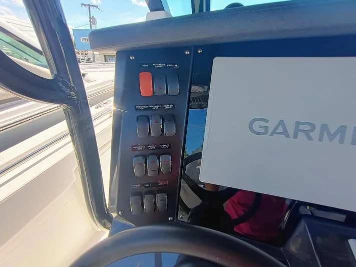  Yacht Photos Pics Control panel of 2025 Blackfin 332 CC boat with Garmin display.