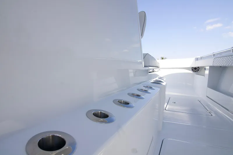  Yacht Photos Pics 2026 Invincible 36 Catamaran interior with sleek design and multiple cup holders.