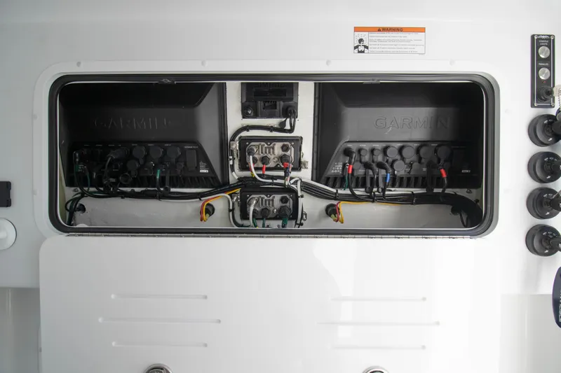  Yacht Photos Pics Electrical panel of 2026 Invincible 36 Catamaran with Garmin systems and wiring.