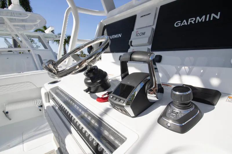  Yacht Photos Pics Control panel of 2026 Invincible 36 Catamaran featuring Garmin and Icom electronics.