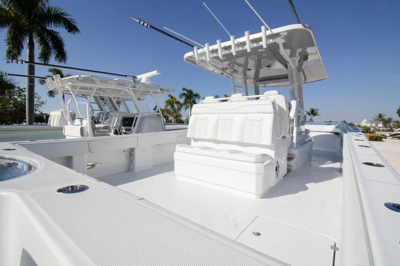  Yacht Photos Pics 2026 Invincible 36 Catamaran with sleek white design, spacious deck, and modern features.