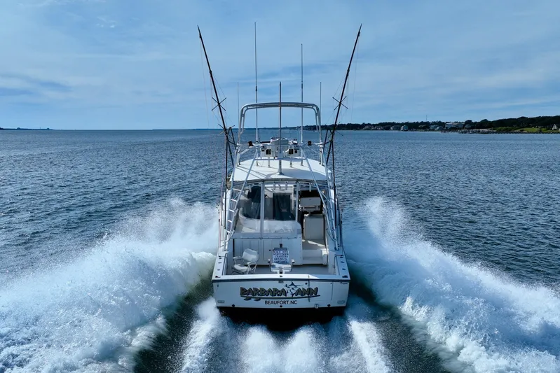 Barbara Ann Yacht Photos Pics 2001 Carolina Classic 35 Express boat cruising on open water.