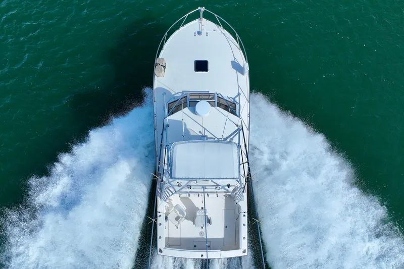 Barbara Ann Yacht Photos Pics Aerial view of 2001 Carolina Classic 35 Express boat cruising on water.