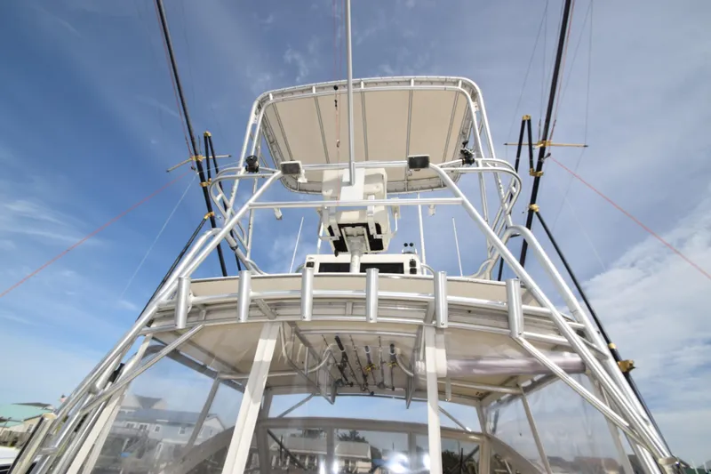 Barbara Ann Yacht Photos Pics 2001 Carolina Classic 35 Express boat tower against a clear blue sky.