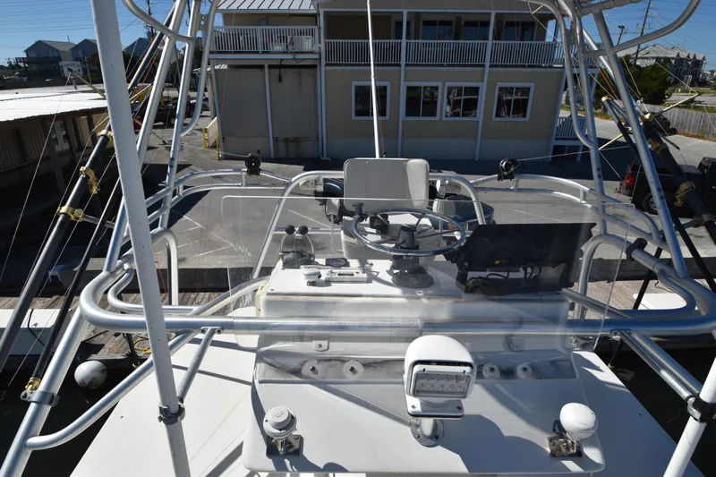 Barbara Ann Yacht Photos Pics 2001 Carolina Classic 35 Express boat helm with steering wheel and controls.