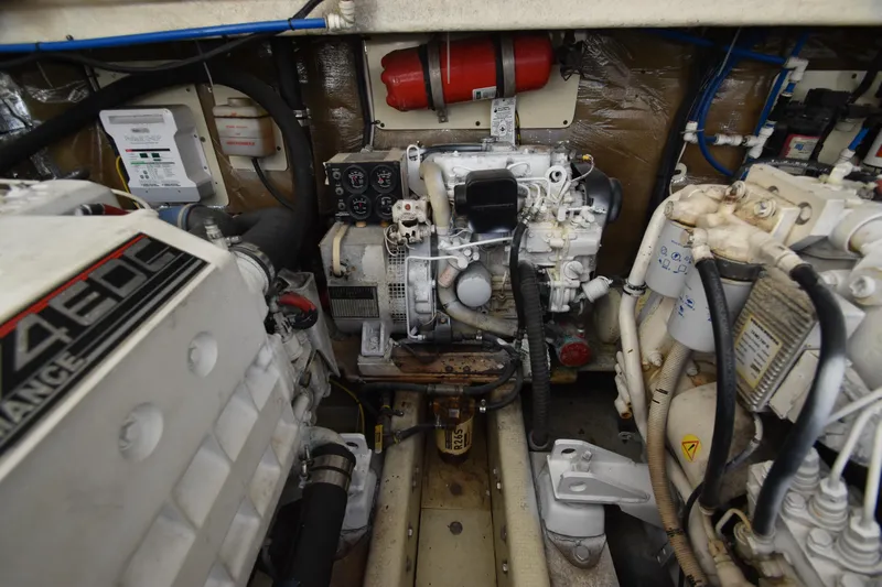 Barbara Ann Yacht Photos Pics Engine room of a 2001 Carolina Classic 35 Express boat, showcasing mechanical components.