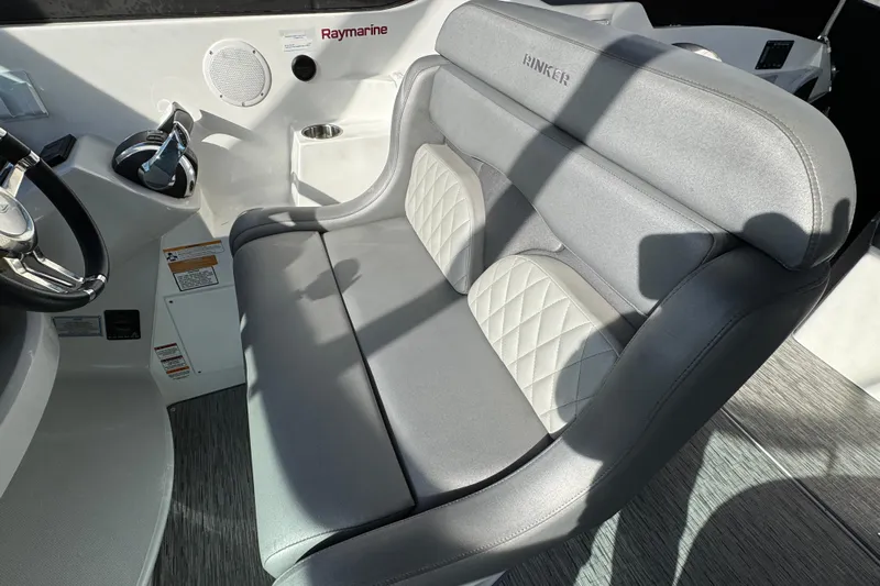  Yacht Photos Pics 2020 Rinker 320 EX boat interior with gray seating and steering wheel.