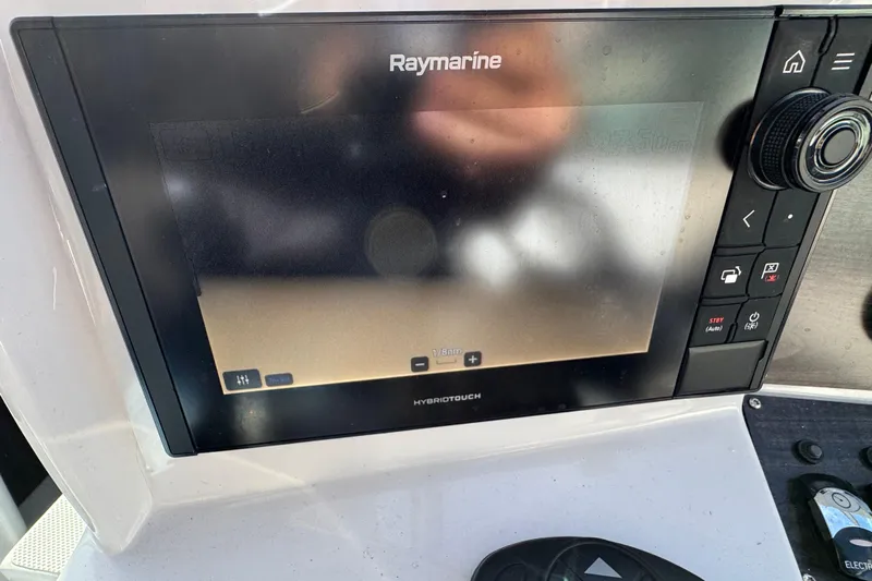 Yacht Photos Pics Raymarine navigation display on 2020 Rinker 320 EX boat dashboard.