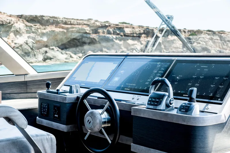 Loloma Yacht Photos Pics Helm of 2025 Zeelander 7 yacht with advanced navigation controls and displays.