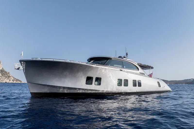 Loloma Yacht Photos Pics 2025 Zeelander 7 yacht cruising on open water under clear blue sky.