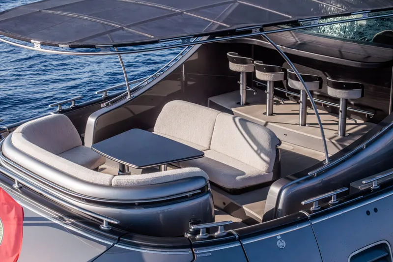 Loloma Yacht Photos Pics Luxurious 2025 Zeelander 7 yacht with elegant seating and bar area on deck.