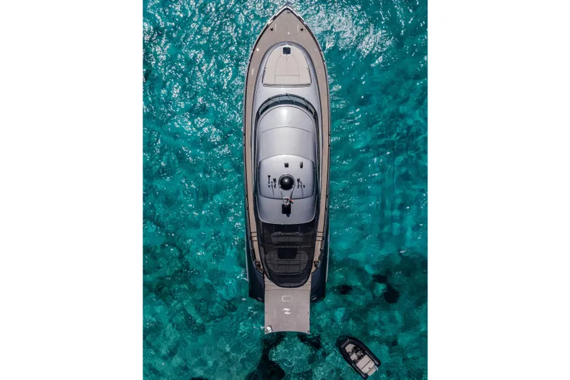 Loloma Yacht Photos Pics Aerial view of 2025 Zeelander 7 yacht on clear turquoise water.