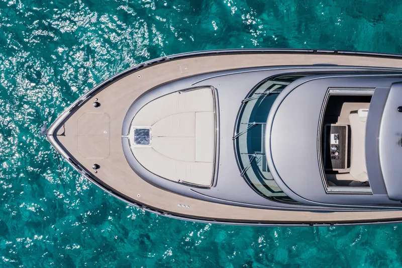 Loloma Yacht Photos Pics Aerial view of 2025 Zeelander 7 yacht on clear turquoise water.