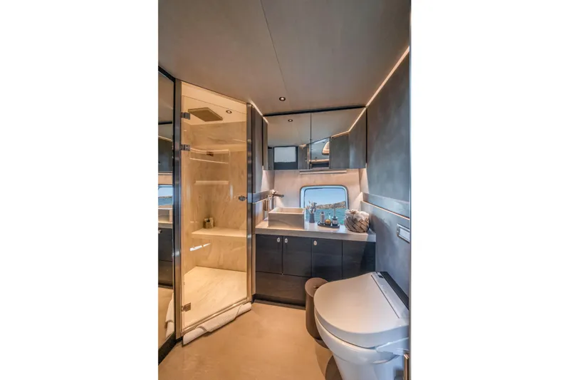 Loloma Yacht Photos Pics Luxurious bathroom interior of 2025 Zeelander 7 yacht with modern fixtures and elegant design.