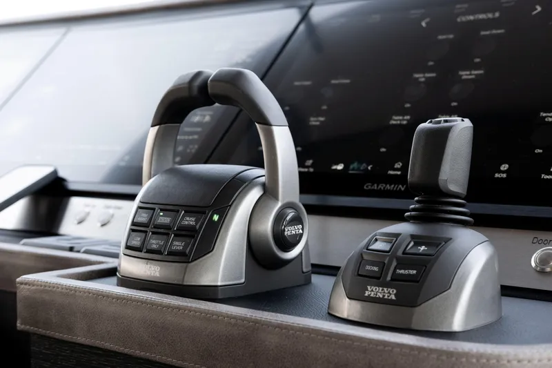 Loloma Yacht Photos Pics Control panel of 2025 Zeelander 7 yacht featuring Volvo Penta throttle and joystick.