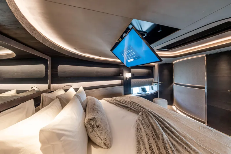 Loloma Yacht Photos Pics Luxurious interior of 2025 Zeelander 7 yacht with modern design and cozy bedding.