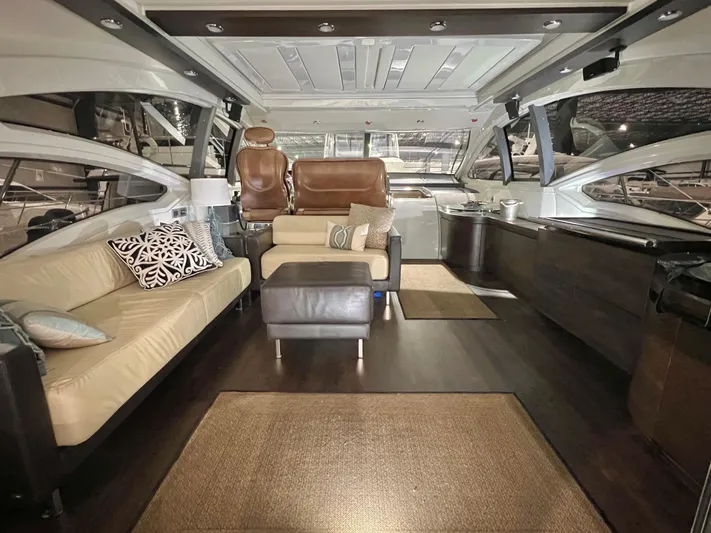  Yacht Photos Pics Luxurious interior of a 2010 Azimut 62S yacht with modern furnishings.