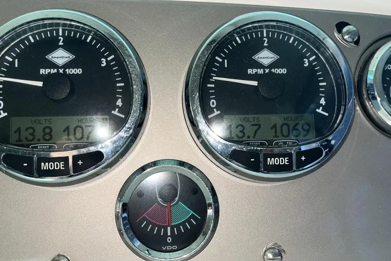  Yacht Photos Pics Dashboard of a 2007 Prestige 46 boat showing RPM and voltage gauges.