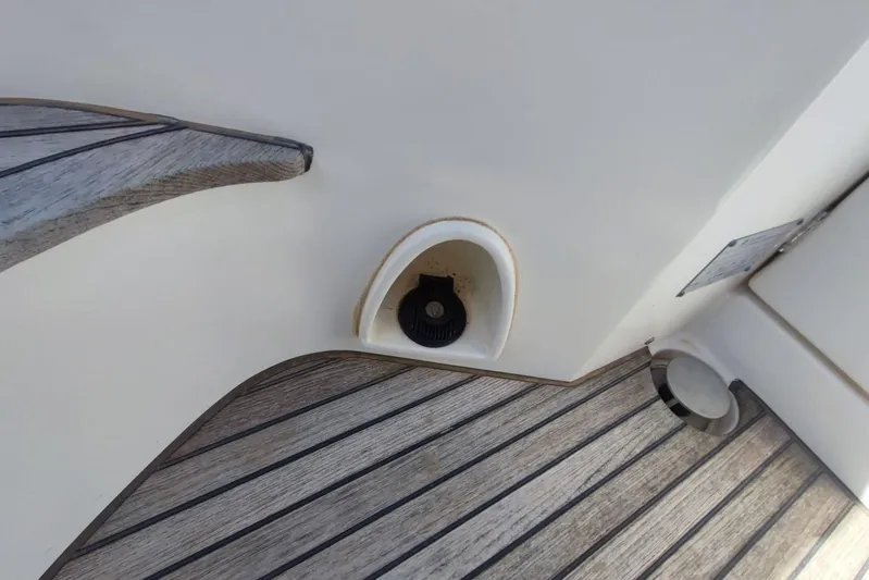  Yacht Photos Pics 2007 Prestige 46 yacht deck with wood finish and built-in speaker.