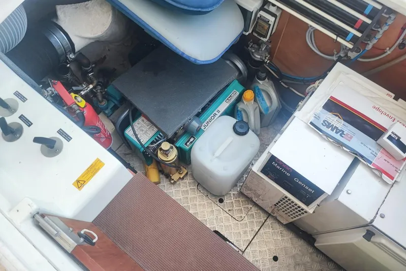  Yacht Photos Pics Engine room of a 2007 Prestige 46 yacht with equipment and maintenance supplies.