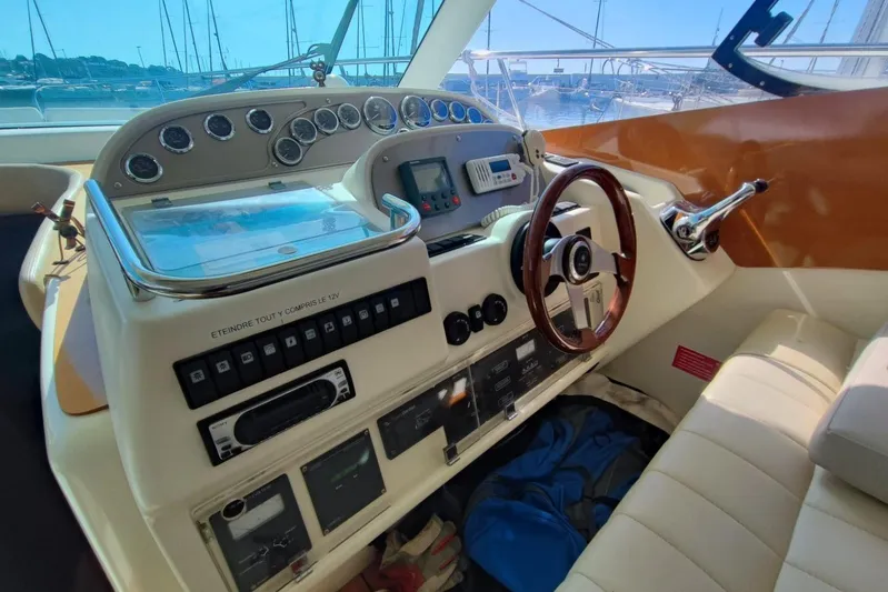  Yacht Photos Pics Interior helm of 2007 Prestige 46 yacht with navigation controls and steering wheel.
