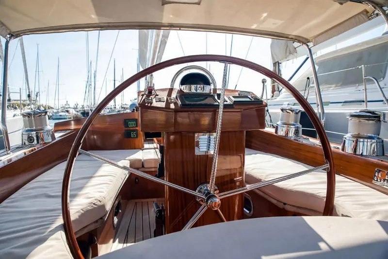 Spirit R74 Yacht Photos Pics Luxurious 2014 Spirit R74 yacht cockpit with wooden steering wheel and plush seating.