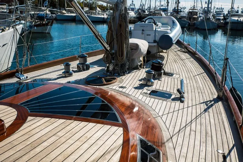 Spirit R74 Yacht Photos Pics Luxurious 2014 Spirit R74 yacht deck with polished wood finish in marina setting.