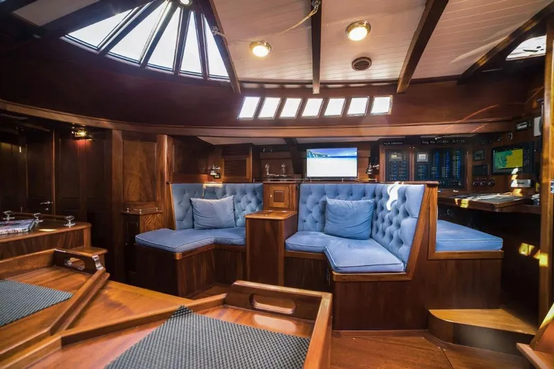 Spirit R74 Yacht Photos Pics Luxurious interior of 2014 Spirit R74 yacht with plush seating and elegant wood finish.