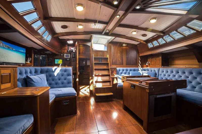 Spirit R74 Yacht Photos Pics Luxurious 2014 Spirit R74 yacht interior with elegant wood and blue upholstery.