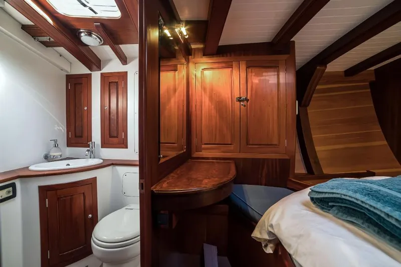 Spirit R74 Yacht Photos Pics Luxurious wooden interior of 2014 Spirit R74 yacht cabin with bathroom.