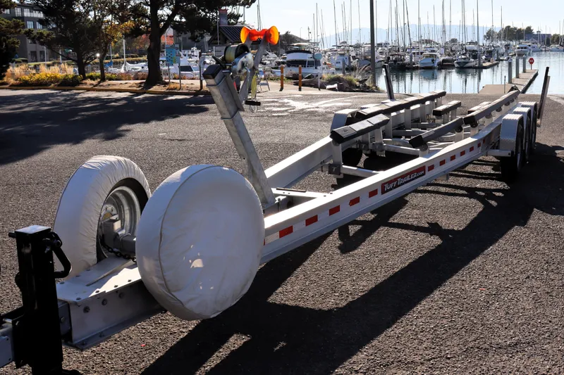 Knot Busy Yacht Photos Pics Boat trailer for 2017 Ranger Tugs R-29 CB at marina, sunny day.