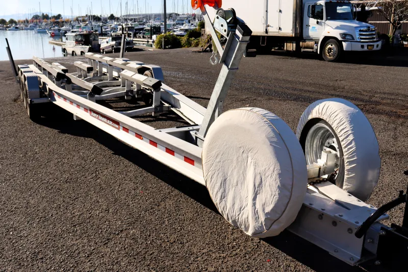 Knot Busy Yacht Photos Pics Boat trailer for 2017 Ranger Tugs R-29 CB at marina, sunny day.