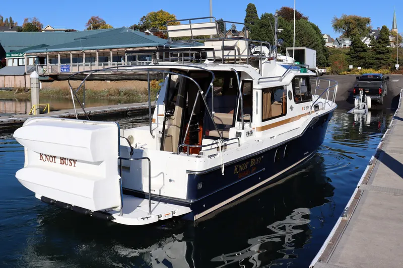 Knot Busy Yacht Photos Pics 2017 Ranger Tugs R-29 CB boat named "Knot Busy" docked at marina.