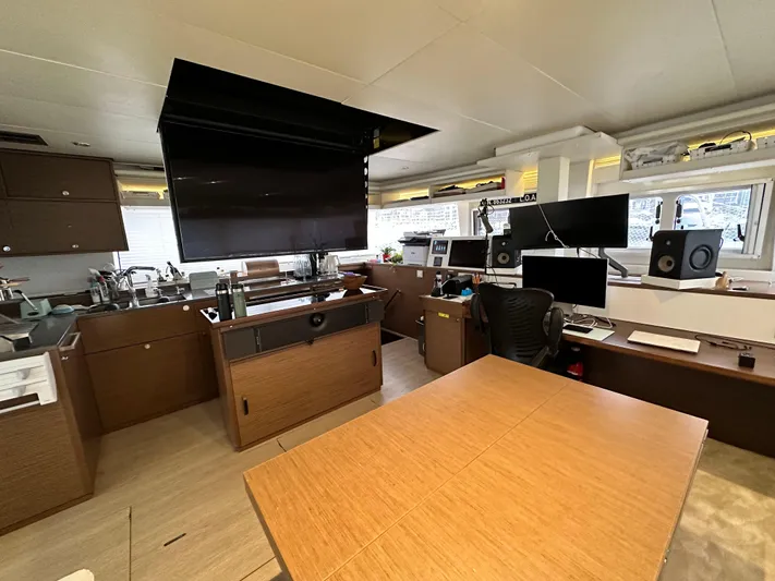 Topdog Yacht Photos Pics Interior of 2018 Lagoon 560 S2 yacht with modern navigation and entertainment systems.
