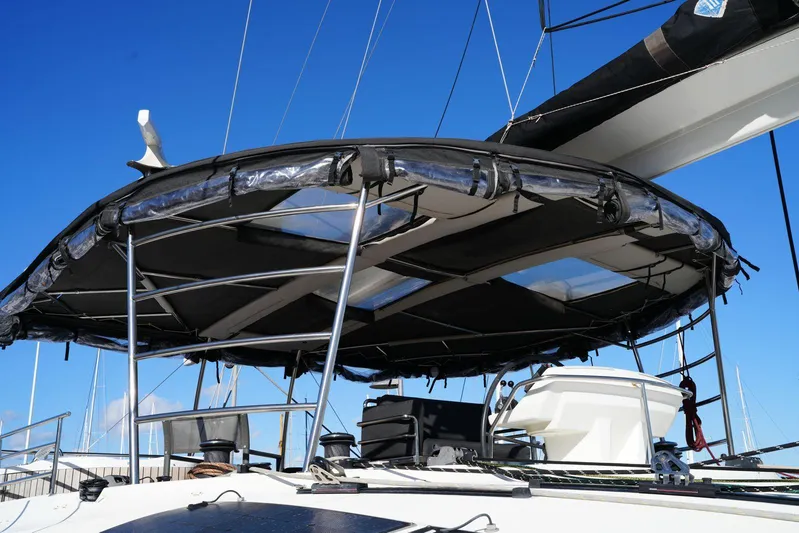 Topdog Yacht Photos Pics 2018 Lagoon 560 S2 yacht with sunshade and clear blue sky background.