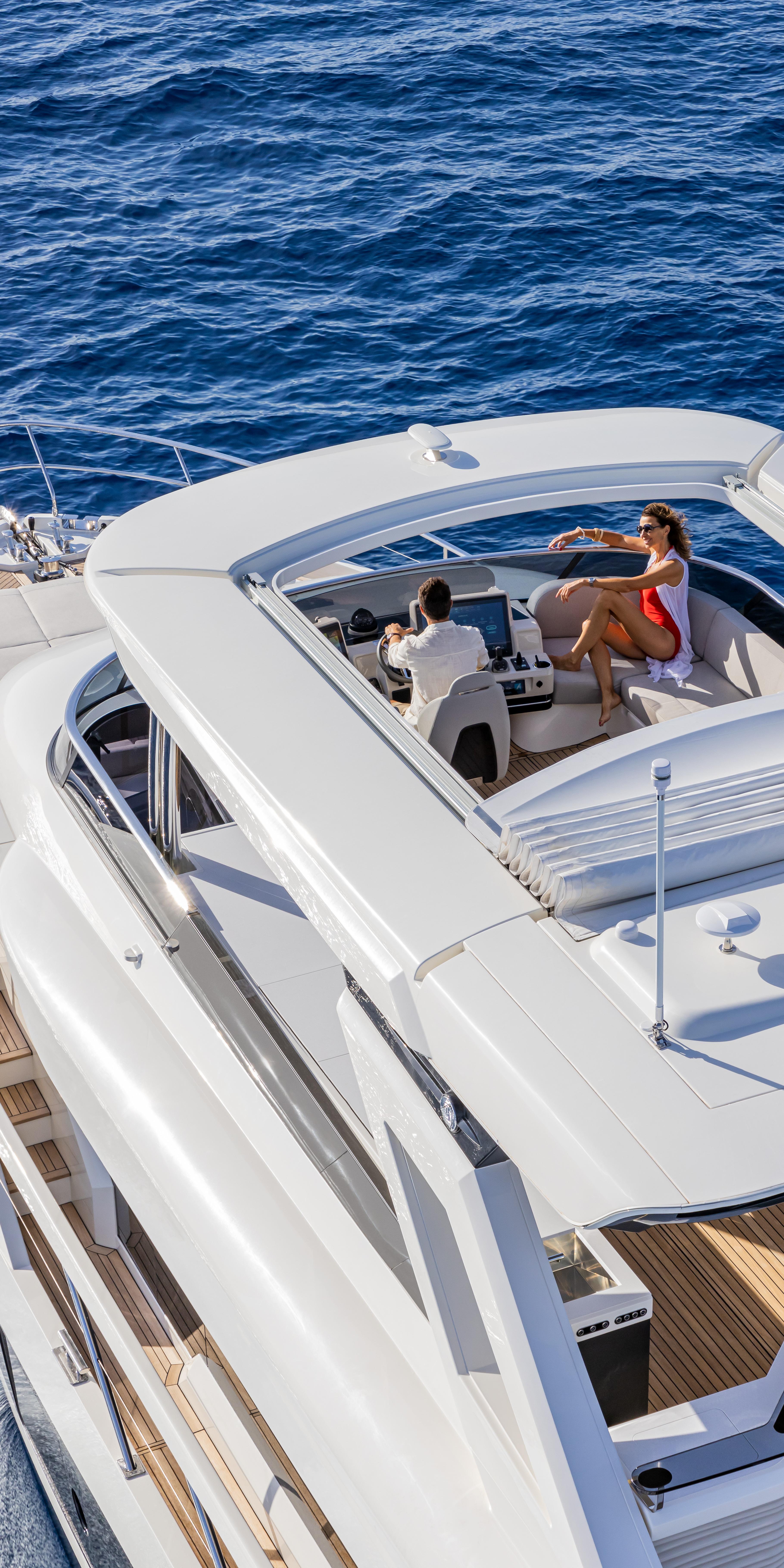 Luxury Absolute NAVETTA 75 yacht cruising on open sea, 2025 model.