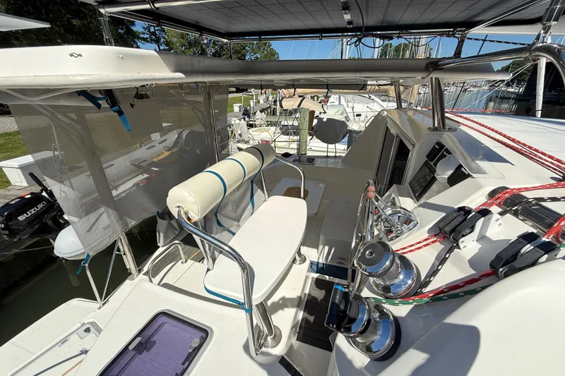 Selah Yacht Photos Pics 2010 Leopard 38 catamaran cockpit with steering wheel, winches, and seating area.