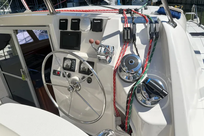 Selah Yacht Photos Pics Steering wheel and controls of a 2010 Leopard 38 catamaran yacht.