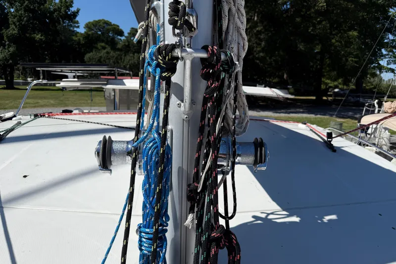 Selah Yacht Photos Pics Sailboat mast with colorful ropes on a 2010 Leopard 38 catamaran.