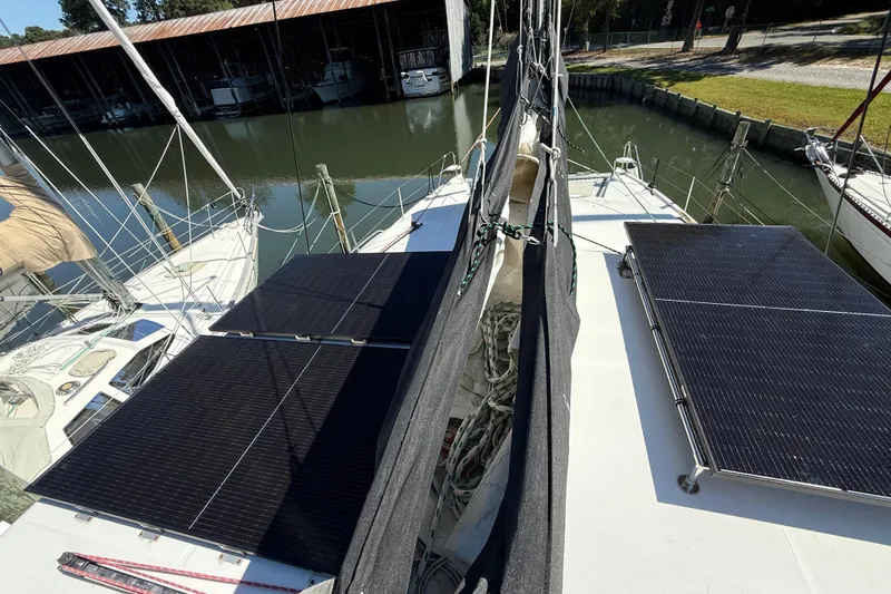 Selah Yacht Photos Pics 2010 Leopard 38 catamaran with solar panels docked at marina.