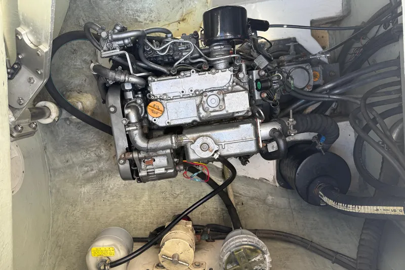 Selah Yacht Photos Pics Engine compartment of a 2010 Leopard 38, showcasing mechanical components and wiring.