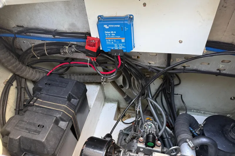 Selah Yacht Photos Pics Engine compartment of a 2010 Leopard 38 with Victron Energy charger and wiring.