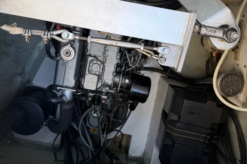 Selah Yacht Photos Pics Engine compartment of a 2010 Leopard 38 catamaran, showcasing mechanical components and wiring.