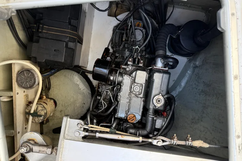 Selah Yacht Photos Pics Engine compartment of a 2010 Leopard 38, showcasing mechanical components and wiring.