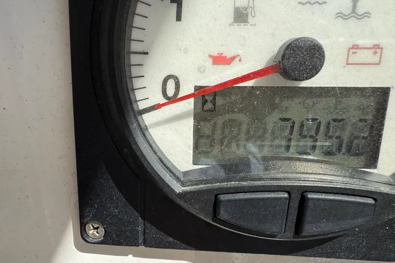 Selah Yacht Photos Pics Close-up of a Leopard 38 engine gauge displaying 7952 hours.