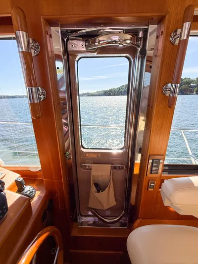 Mystique Yacht Photos Pics Interior view of 2014 Grand Banks 50 Eastbay SX yacht with ocean backdrop.