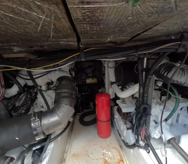  Yacht Photos Pics Engine room of a 2003 Sea Ray 435 boat, featuring mechanical components and wiring.