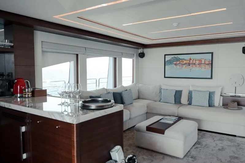  Yacht Photos Pics Luxurious interior of 2018 Majesty 125 yacht with elegant seating and modern decor.