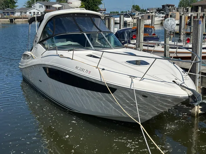 Harborviewbayview Yacht Photos Pics 2016 Sea Ray 330 Sundancer docked in a marina, reflecting on calm water.